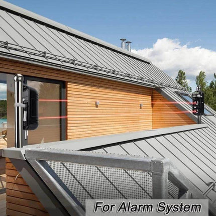 Dual Beam Infrared Detector for Outdoor Security Alarms mounted on house exterior showing dual infrared beams across a balcony perimeter