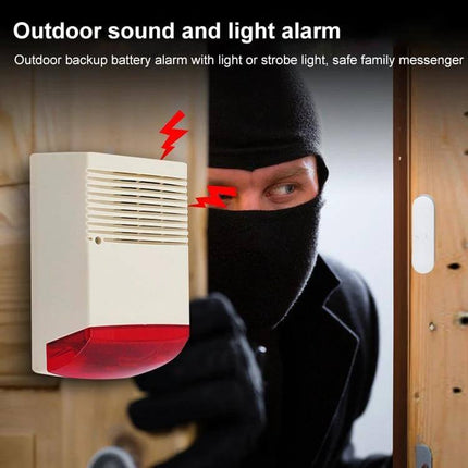 Reliable Outdoor Siren with Flashlight for Home Security mounted outside doorway emitting loud alarm and flashing light to deter intruder