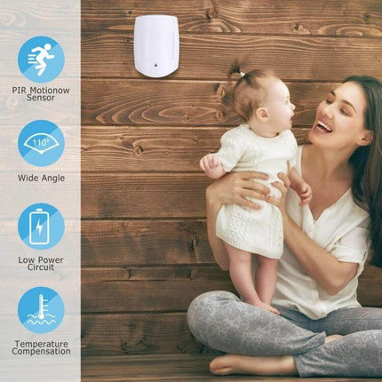 PIR Motion Sensor with Adjustable Sensitivity for Home Security mounted in hallway above mother holding baby to monitor for intruders