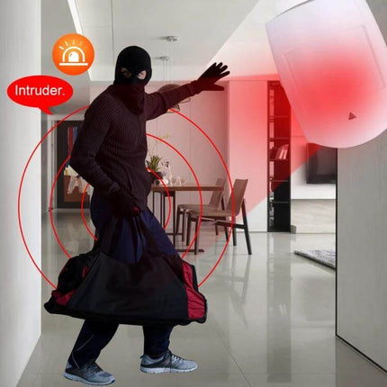 PIR Motion Sensor with Adjustable Sensitivity for Home Security detecting an intruder in hallway with red alert signal