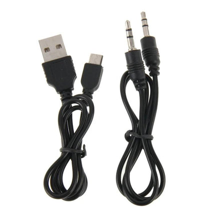 Compact Bluetooth Speaker For Everyday Listening And Calls USB charging cable and 3.5mm aux cable bundled for connectivity.