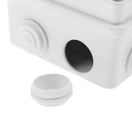 Waterproof Plastic Enclosure for Security Camera Power Supplies, 15cm x 11cm x 7cm showing cable gland and knockout hole close-up