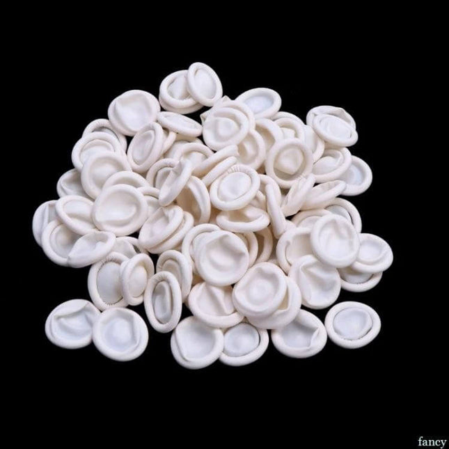 Latex Anti-Static Finger Cot 2x6cm for Electronics Handling - 50 white latex finger cots piled for electronics assembly and delicate work