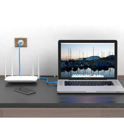 Blue Cat5e Network Cable for Reliable Ethernet Connections, 3 Meters connecting router to laptop on home office desk