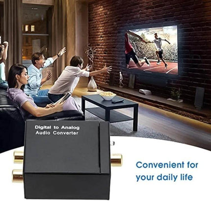 Analog RCA to Digital Optical Coaxial Audio Converter black box shown in living room connecting vintage stereo to modern TV