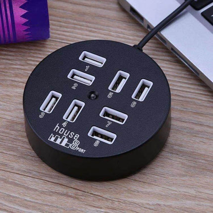 Portable 8-Port USB 2.0 Hub for Laptops and Devices - compact round black USB hub connected to laptop, showing eight numbered USB-A ports for peripherals