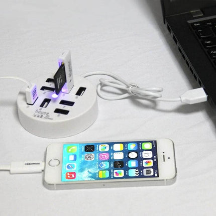 Portable 8-Port USB 2.0 Hub for Laptops and Devices shown powering multiple USB devices and charging a smartphone
