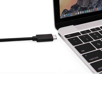 Practical USB Hub for Everyday Laptop Connections shown with USB-C cable plugged into laptop keyboard for organizing peripherals and fast data transfer