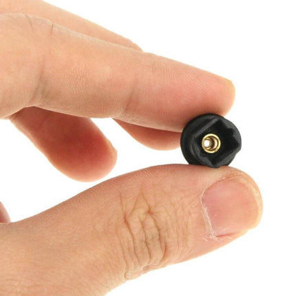 Gold Plated 90-Degree Optical Fiber Adapter for Digital Audio held between fingers showing right-angle gold-plated connector
