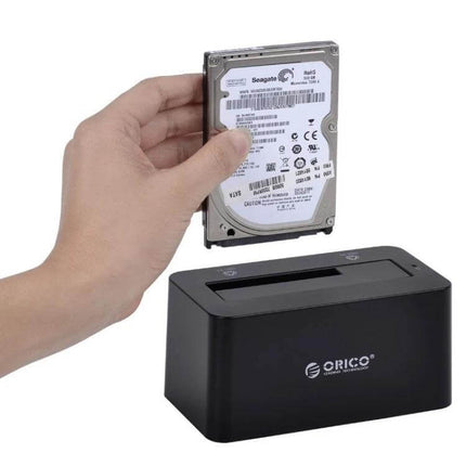 Orico Hard Drive Docking Station for 2.5 and 3.5 Inch Drives with hand inserting 2.5" HDD via USB 3.0 for backups and quick swap