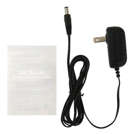 Gigabit Ethernet Switch with 8 Ports for Home Networks power adapter and user manual laid out on white background