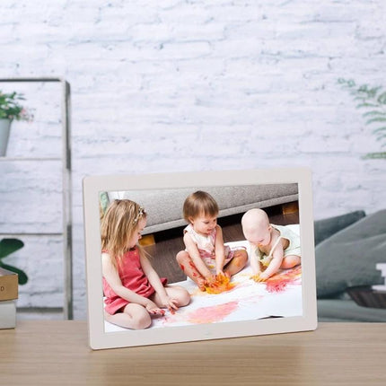 17-Inch Digital Photo Frame for Viewing Photos and Videos showing three children painting a colorful art scene on a living room table
