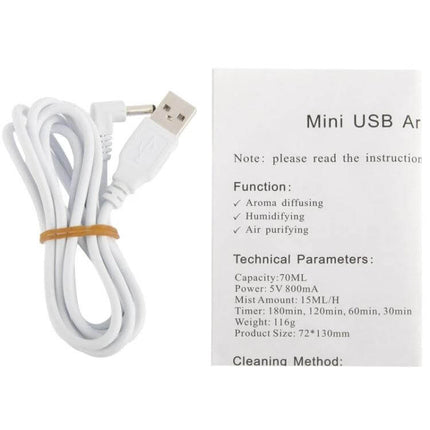 Mini USB Aroma Diffuser With Warm White LED Lights - USB cable and instruction manual showing specs and timer options