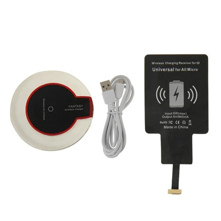 A Practical Charger for Daily Phone Use at Home wireless charging pad with USB cable and universal receiver on white background