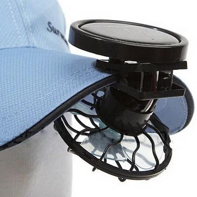 Compact Clip-on Solar Powered Fan for Travel Cooling Use clipped to a hat brim showing solar panel and rotating fan
