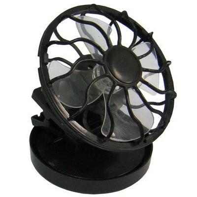 Compact Clip-on Solar Powered Fan for Travel Cooling Use - black clip-on solar travel fan clipped to hat or bag for hands-free outdoor cooling