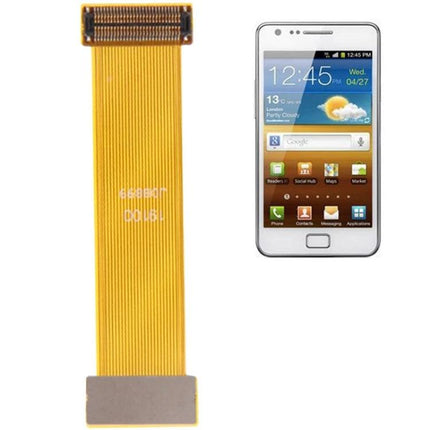 Essential Extension Cable for Daily Phone Maintenance Tasks - flexible yellow USB extension cable next to smartphone for charging and data transfer