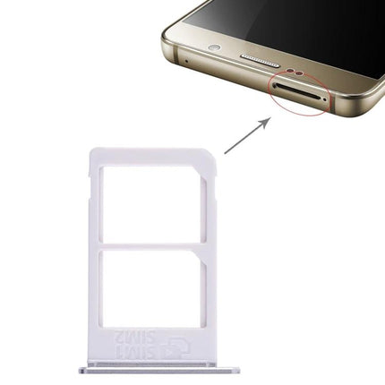 Replacement SIM Card Tray for Samsung Galaxy Note 5 Phones - white dual-slot SIM tray replacement for Note 5 shown next to phone