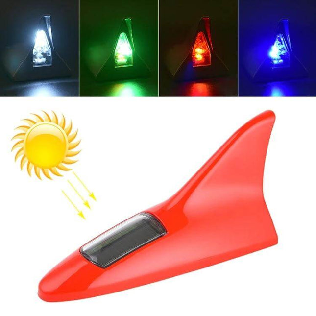 Solar Shark Fin Alarm Light for Cars High-Positioned mounted red solar-powered roof beacon showing multicolor LEDs and adhesive peel-and-stick installation