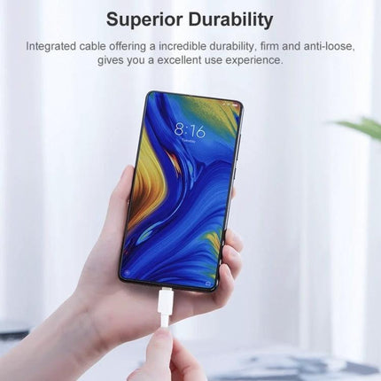 Practical USB Cable for Daily Device Charging and Transfers - hand plugging durable USB cable into smartphone for charging and data sync