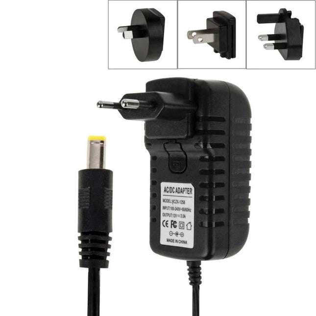 12V 3A DC Power Adapter with EU, US, UK, and AU Plugs for Devices - Black travel power supply with multiple plug heads and DC barrel connector
