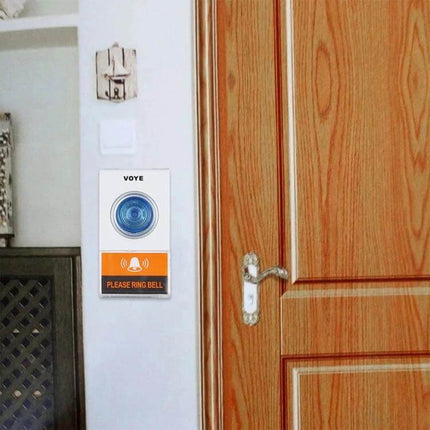 VOYE Wireless Doorbell for Home Entry Notifications with Custom Sounds mounted beside a wooden front door showing alert light and 'Please Ring Bell' label