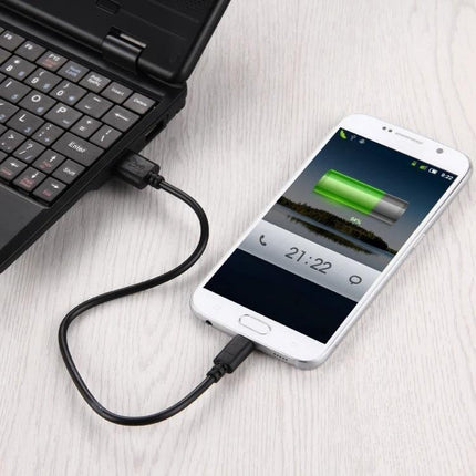 Micro USB Charging Cable for Everyday Home and Travel Needs - phone charging from laptop on desk