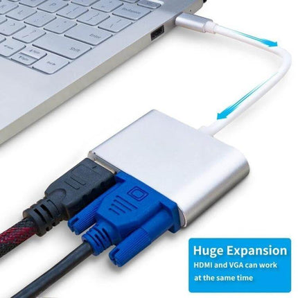 Reliable USB-C Adapter for HDMI and VGA Display Connections plugged into laptop showing simultaneous HDMI and VGA outputs for presentations and dual-monitor setups