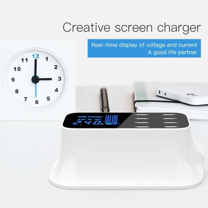 Essential USB Charging Station for Daily Home Device Needs on bedside table with digital screen showing voltage and multiple devices charging