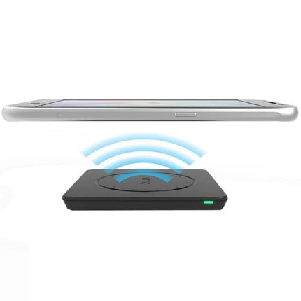 Keep your devices charged daily with the Vinsic Wireless Pad shown charging a smartphone wirelessly on a slim black Qi pad