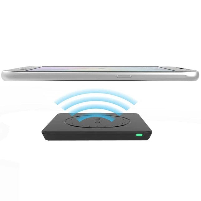 Keep your devices charged daily with the Vinsic Wireless Pad shown charging a smartphone wirelessly on a slim black Qi pad