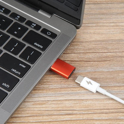 This adapter connects USB-C devices for everyday charging plugged into laptop with Type-C cable