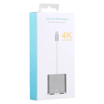 Compact USB-C Adapter for Dual HDMI Display Connections - slim silver dual HDMI 4K adapter in retail packaging, ideal for portable dual-monitor setup