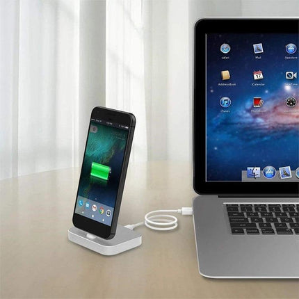 Practical Desk Stand for Type-C Smartphone Charging on aluminum alloy dock holding phone upright while charging beside a laptop