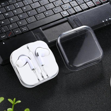 Wired In-Ear Earphones With Microphone For Calls And Commuting white wired earbuds in case beside laptop, 1.2m cable, 3.5mm plug