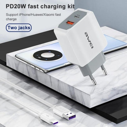 Awei Travel Charger for Everyday Device Needs Abroad plugged into a European outlet charging smartphone and tablet, dual-port fast charger