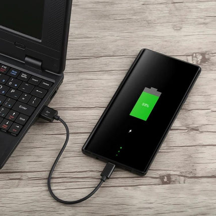 USB-C Cable for Everyday Device Charging at Home powering smartphone from laptop with durable TPE cover and fast charging