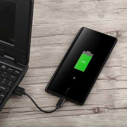 Compact USB-C Cable for Daily Device Charging and Syncing connecting power bank to laptop for on-the-go charging and quick file sync