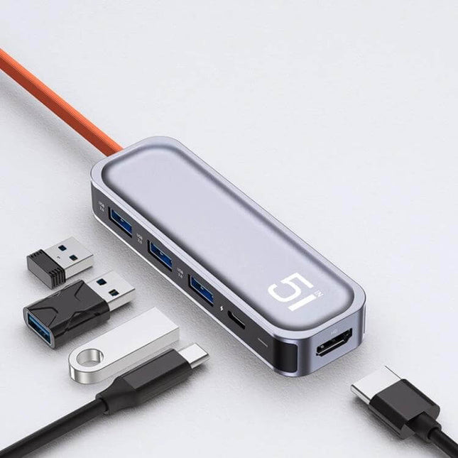 ROCK USB-C Docking Station with HDMI and USB Expansion Ports shown with multiple USB devices, HDMI and USB 3.0 ports for laptop connectivity
