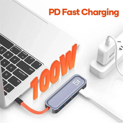 ROCK USB-C Docking Station with HDMI and USB Expansion Ports shown connected to laptop with 100W PD fast charging and USB expansion