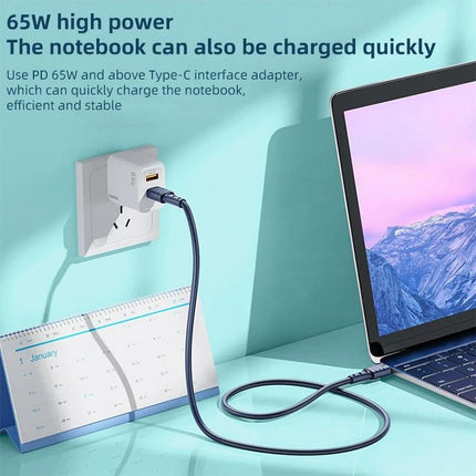 REMAX USB-C to USB-C Cable for Daily Device Charging at Home – 65W fast charging cable connected from wall adapter to laptop on desk