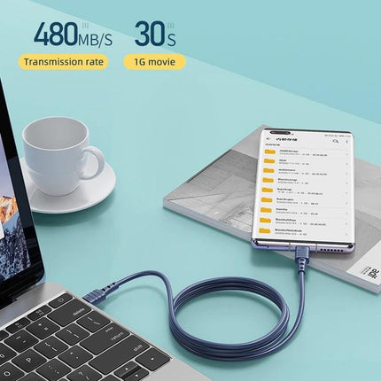 REMAX USB-C to USB-C Cable for Daily Device Charging at Home connecting laptop to smartphone on a desk, showing fast 480MB/s transfer and smart chip