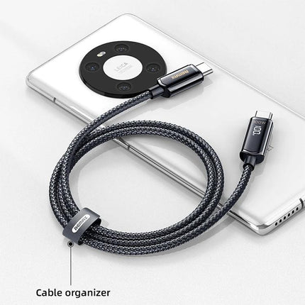 REMAX Cable for Everyday Device Charging and Syncing braided USB-C cable shown coiled with phone and cable organizer