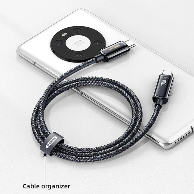 REMAX Cable for Everyday Device Charging and Syncing braided USB-C cable shown coiled with phone and cable organizer