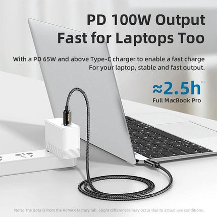 REMAX Cable for Everyday Device Charging and Syncing connected to laptop showing PD 100W fast charging braided cable