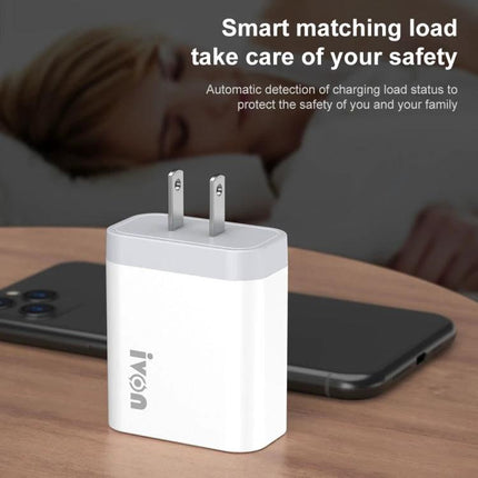 IVON Travel Charger for On-the-Go Device Powering compact white wall charger shown on table beside smartphone, safe smart matching load
