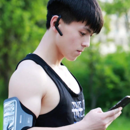 Bluetooth Headset For Hands Free Calls Lightweight Fit worn by man jogging, ergonomic earbud, pocketable design for commuting
