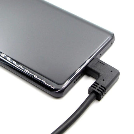 Compact Elbow Cable for Daily Device Connections at Home plugged into smartphone on nightstand, right-angle connector reducing strain and tangles