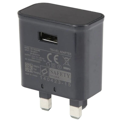 Essential Travel Adapter for Daily Device Charging compact black USB travel adapter with UK plug for phones and tablets
