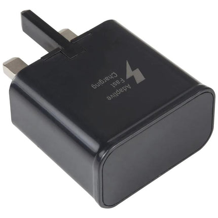 Black compact Essential Travel Adapter for Daily Device Charging with UK plug and fast charging icon